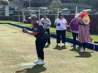 Clinical team member taking part in a friendly bowls game during Hospice Whanganui’s annual planning retreat at Laird Park Bowling Club.